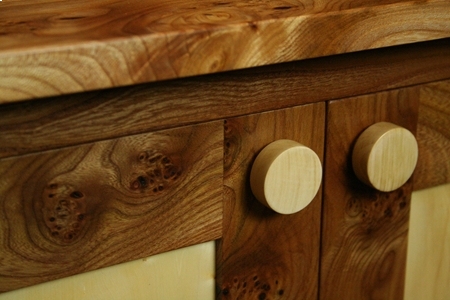An Elm & Horse Chestnut sideboard showing handle detail